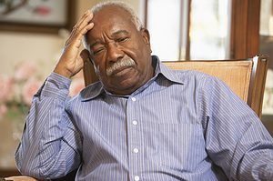 Senior man relaxing in armchair